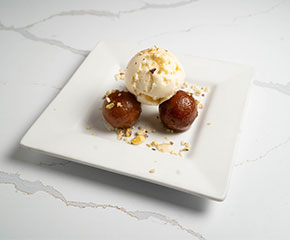 Gulab jamun with vanilla ice cream