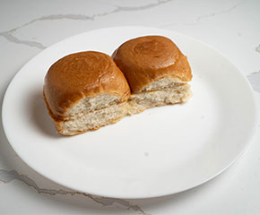 Pair of soft pav bread rolls