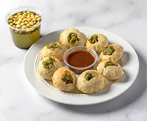 Crisp pani puri with tangy water